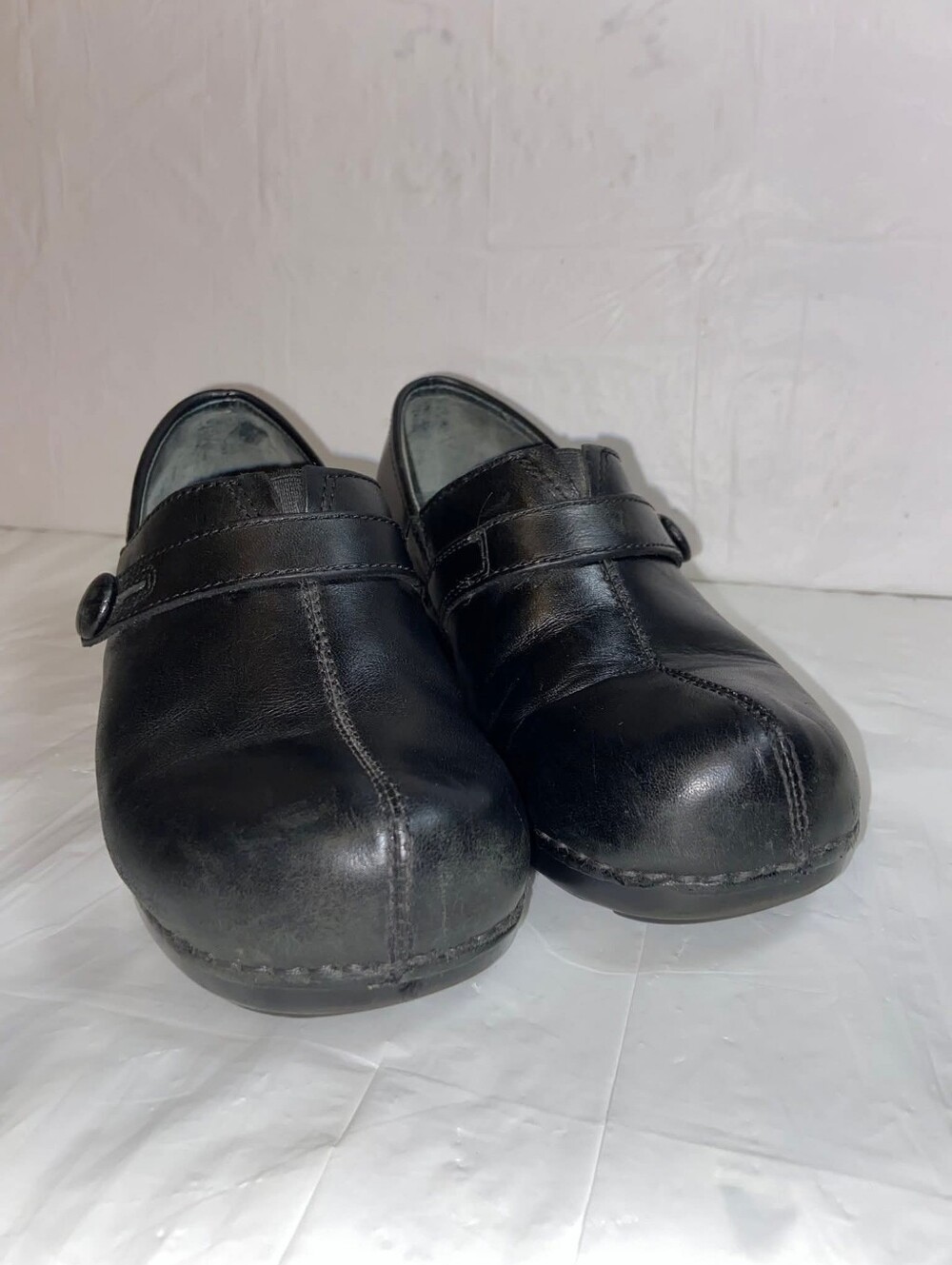 Dansko Black Leather Slip-On Clogs